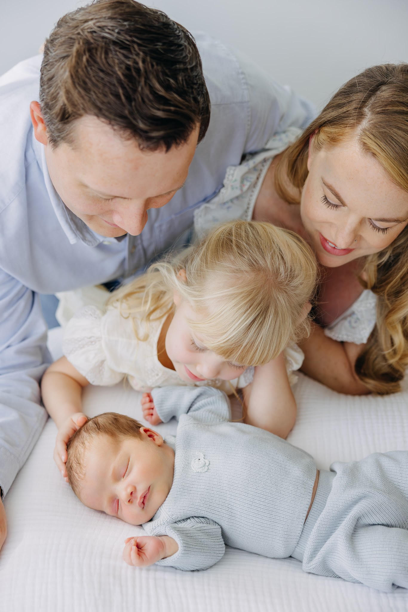 Family all together during an studio newborn session